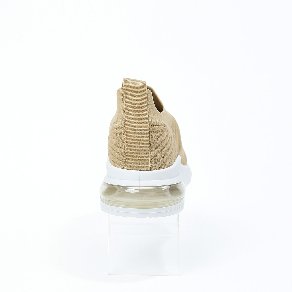 beige Adidas slip-on shoes with a white sole. 36883